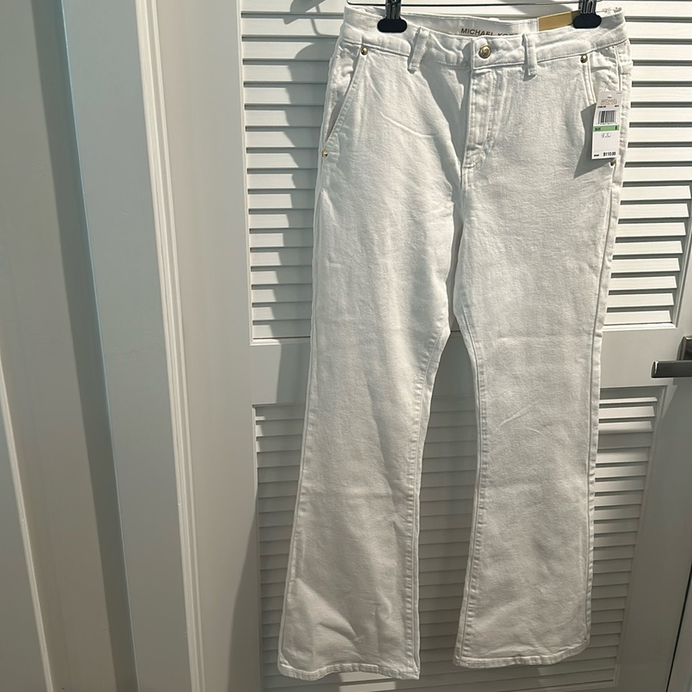 NWT Michael Kors Selma Flare high rise slim thru hip and thigh flare leg jeans.